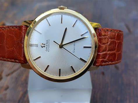 omega genève yellow gold price